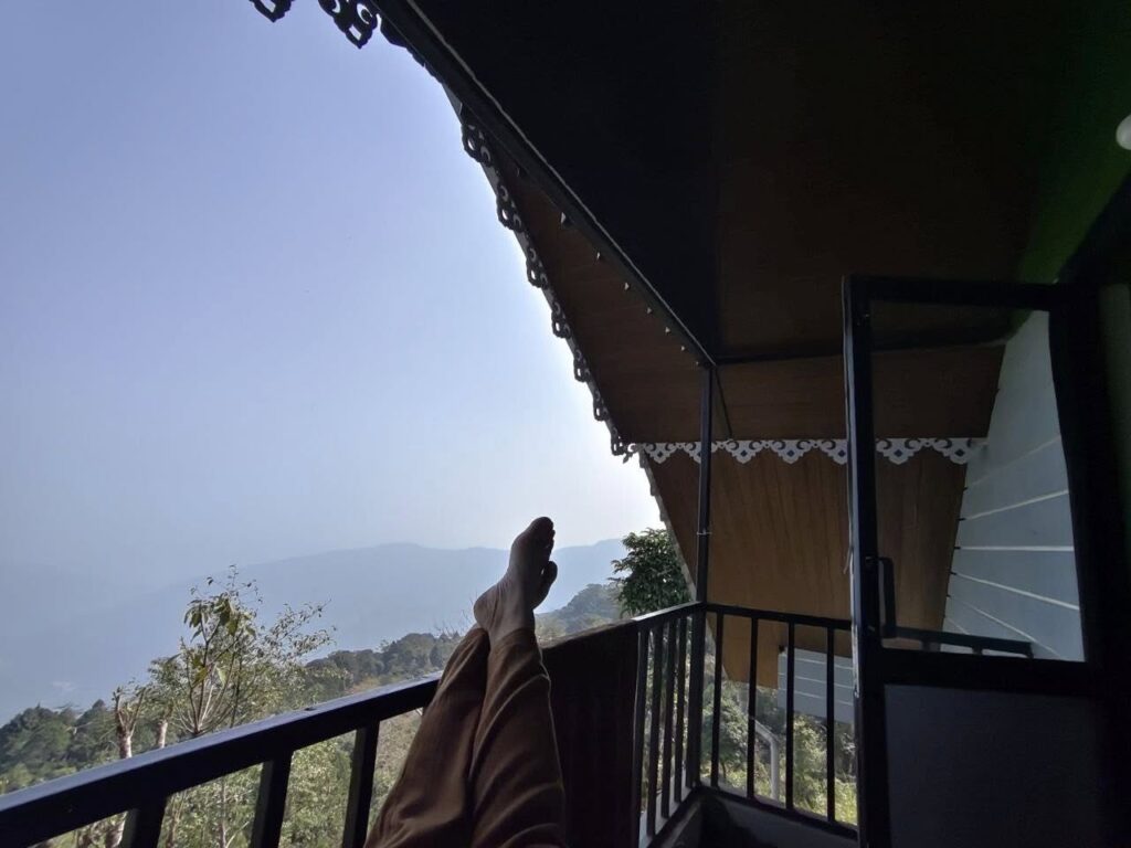 Mountain + Clouds + Loved Ones = Love ❤️❤️
Mountains, clouds, and a loved one—when these three come together, they create a very special kind of love. Amid the hustle of city life, daily work pressure, and the monotony of routine, we suddenly felt the need to escape to the mountains for a while.
Within just three days, a few of us mountain lovers decided, “Let’s go to the hills and enjoy some hot momos!”
No sooner said than done. We quickly booked our train tickets and set off for North Bengal, planning to explore a quiet offbeat village.
After a few hours of journey, we reached a beautiful small village in Upper Sittong. Surrounded by dense mountain forests, peaceful silence, and the breathtaking view of Kanchenjunga standing tall in the distance—the place felt nothing less than a dream.
The homestay where we stayed had an incredible location. The morning mist, clouds covering the hills, birds chirping, and the cool mountain breeze made it feel as if nature itself was gently offering us a moment of peace.
When you want to take a break from the busy rhythm of life, places like this become truly priceless. Spending a few days away from the noise of the city made our hearts feel refreshed, as if we had learned to live again.
For us, it was truly an unforgettable experience—one that will stay in our memories for a long time.
If you also wish to experience such peaceful mountain moments, feel free to contact us.
Travel Serenity
🌐 www.travelserenity.in
📞 8017161604 / 7003829943